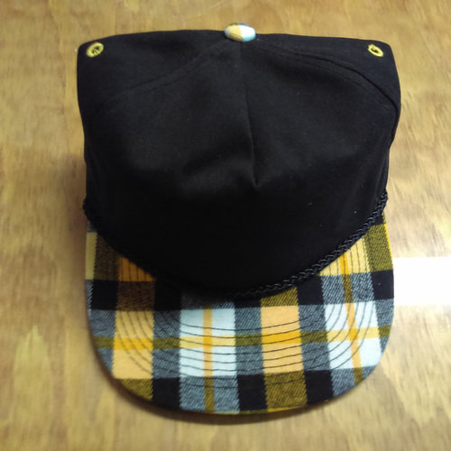 New Otto Cap Hat Black with Yellow Plaid Bill top view